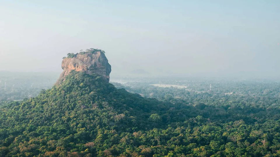 Sigiriya Rock is one of Sri Lanka's most iconic images, soaring out of the ground, th — hero photograph