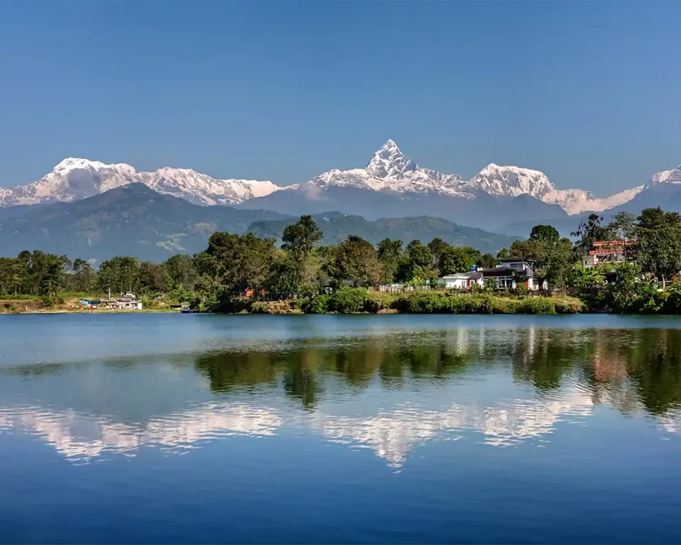 Annapurna peaks reflected in Phewa Lake near Pokhara