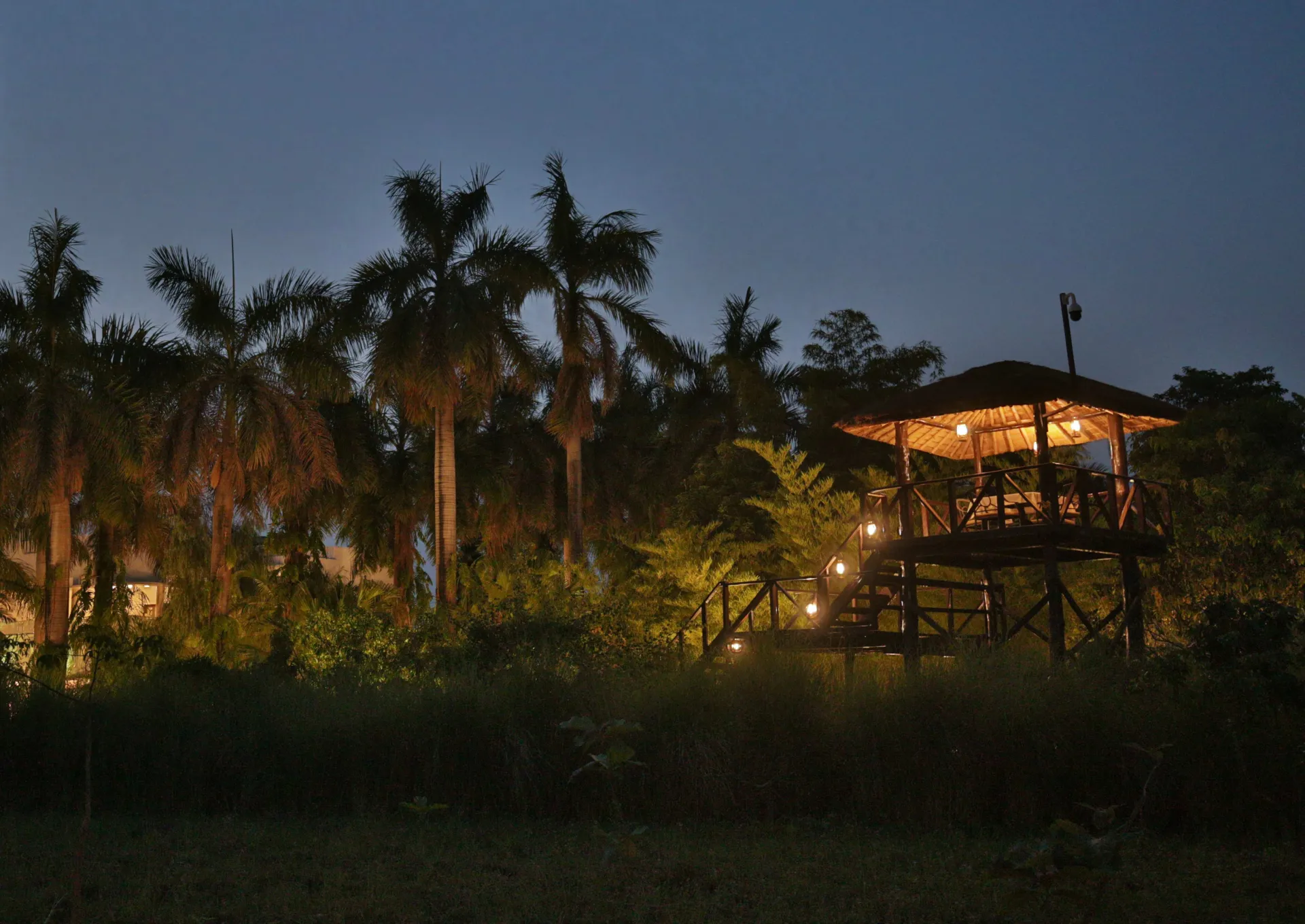 Jaagir Pavilion dining terrace illuminated at night