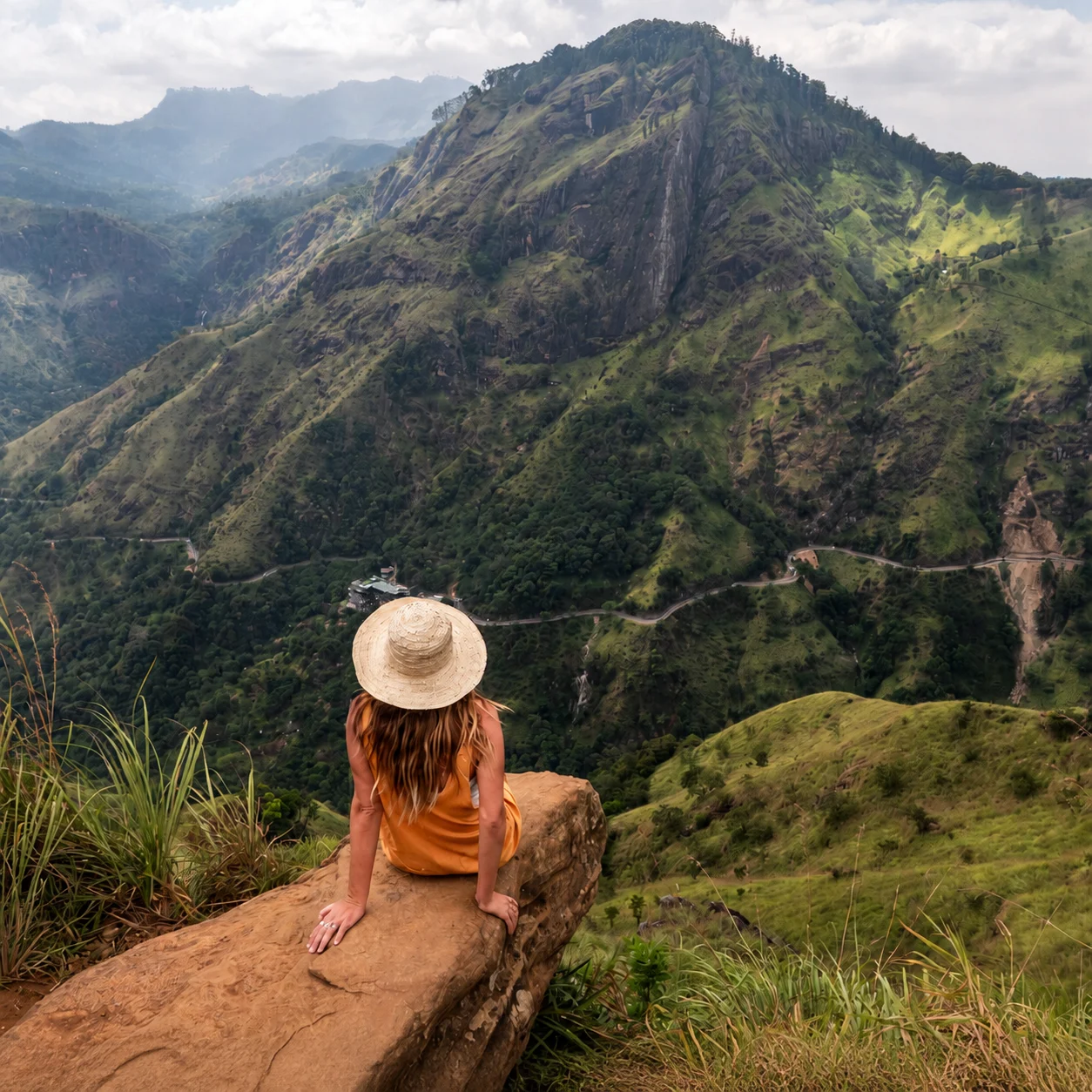 Traveller overlooking the mountain landscape near Ella in Sri Lanka