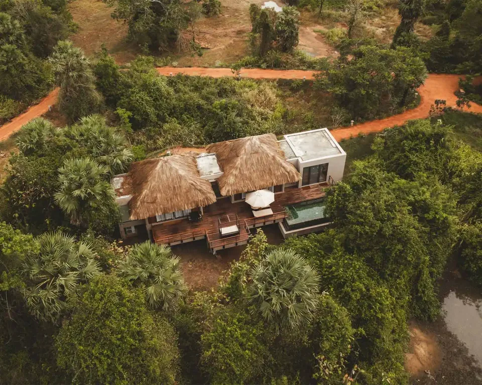 Private luxury villa and swimming pool surrounded by Sri Lankan jungle