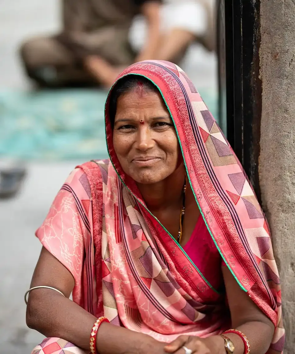Portrait of a woman wearing a pink sari in India